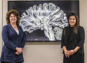 From left: Dr. Peg Nopoulos and Dr. Amanda Benavides pose for a portrait in the University of Iowa Hospitals and Clinics on Wednesday, Sept. 26, 2018. The duo conducted research for the Psychiatry Iowa Neuroimaging consortium on the differences between the brain activity of premature male and female babies. 