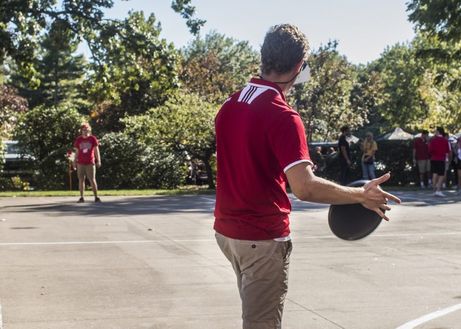 Wisconsin student Ryan Klauck prepares to throw a frisbee on Saturday, September 22, 2018. Both Hawkeye and Badger fans tailgated throughout Iowa City prior to the Iowa vs. Wisconsin  football game. (Katina Zentz/The Daily Iowan)