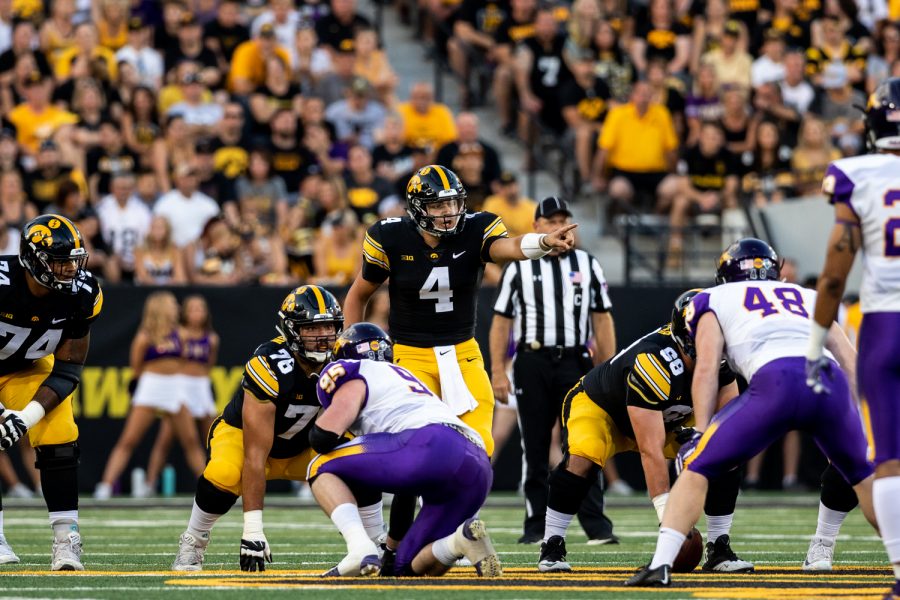Iowa Hawkeyes quarterback Nate Stanley (4) calls out signals to his offense during a game against Northern Iowa at Kinnick Stadium on Saturday, Sep. 15, 2018. The Hawkeyes defeated the Panthers 38–14. (David Harmantas/The Daily Iowan)