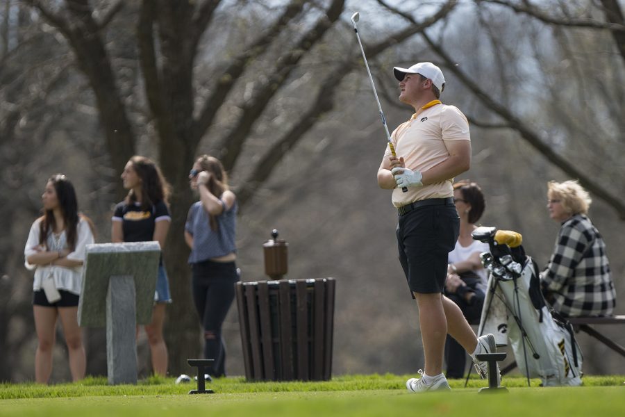 Iowas Alex Schaake watches a ball fly during the Hawkeye Invitational at Finkbine Golf Course on Saturday, April 15, 2017. 