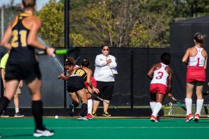 Head Coach Lisa Cellucci watches from the sideline as the Iowa Field Hockey team plays Indiana on Friday, Sept. 29, 2017. Iowa won the match 4-3.