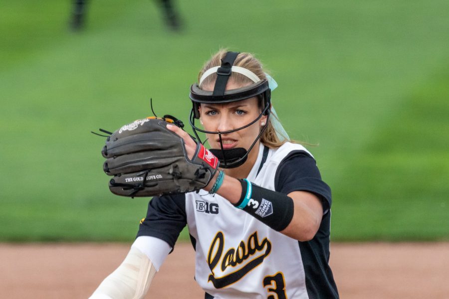 Iowas Allison Doocy winds up to pitch during a softball game against Des Moines Area Community College on Friday, Sep. 21, 2018. The Hawkeyes defeated the Bears 8-1.