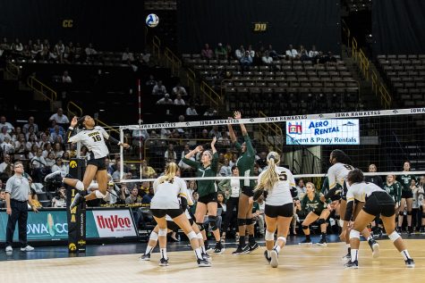 Iowas Taylor Louis goes for a kill during a volleyball match between Iowa and Michigan State on Friday, Sept. 21, 2018. The Hawkeyes defeated the Spartans, 3 sets to 0. 