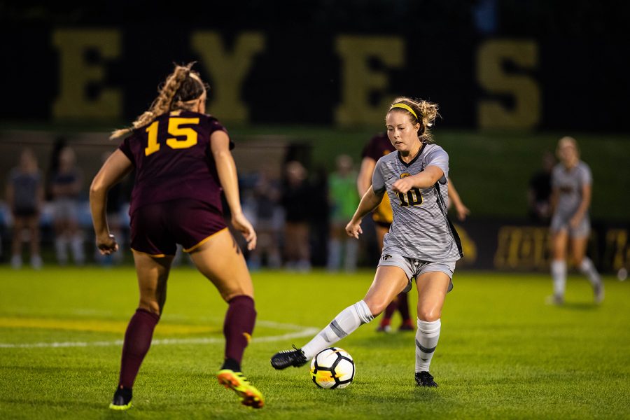 Iowa midfielder Natalie Winters plays a pass during Iowa’s game against Central Michigan on Friday, Aug. 31, 2018. The Hawkeyes defeated the Chippewas 3-1. Winters scored the Hawkeyes’ third goal on a penalty kick in the second half. 
