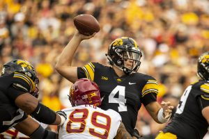Iowa quarterback Nate Stanley throws under pressure during Iowas game against Iowa State at Kinnick Stadium on Saturday, Sept. 8, 2018. The Hawkeyes defeated the Cyclones 13-3.