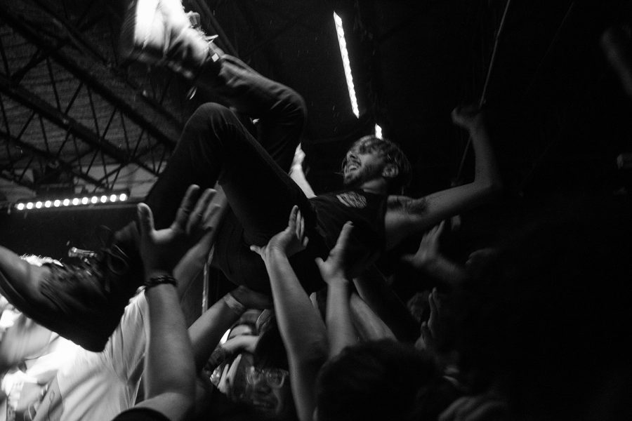 An audience member crowd surfs during the Remo Drive concert at Gabe's on Friday, September 21, 2018.