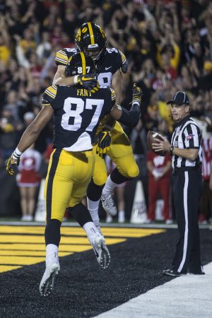 Iowas Noah Fant and TJ Hockenson celebrate a touchdown during a football game between Iowa and Wisconsin on Saturday, Sept. 22, 2018. The Badgers defeated the Hawkeyes, 28-17. 