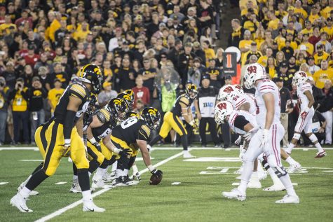 Iowas Keegan Render prepares to snap the ball during a football game between Iowa and Wisconsin on Saturday, Sept. 22, 2018. The Badgers defeated the Hawkeyes, 28-17. 
