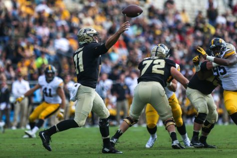 Purdue quarterback David Blough throws the ball during the Iowa v. Purdue football game at Ross–Ade Stadium on Saturday, Oct. 15, 2016. The Iowa Hawkeyes beat the Purdue Boilermakers 49-35. 