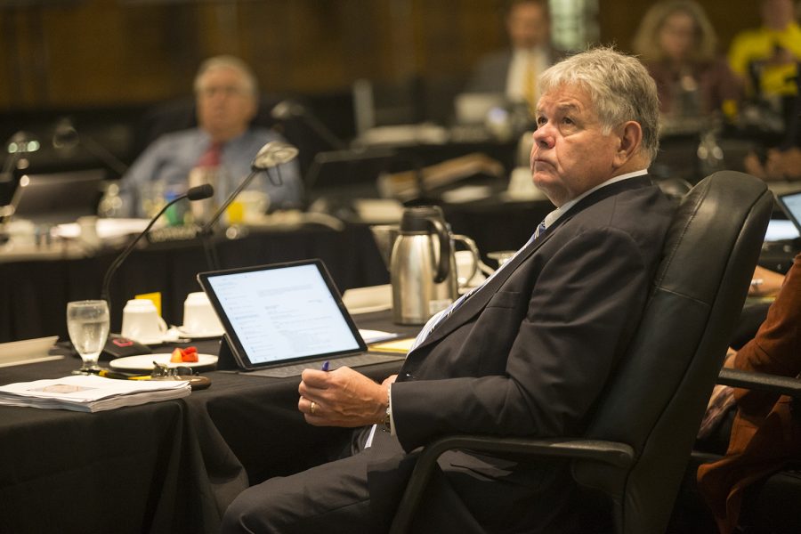 Board member John Lindenmayer listens during the state Board of Regents meeting on Thursday, Sept. 13, 2018 in the IMU Main Lounge. University of Iowa President Bruce Harreld and others made various announcements before being interrupted by Faculty Forward, a protest group for the rights of untenured faculty members.