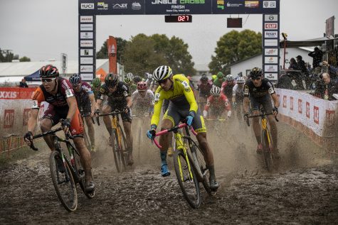 Riders begin the first Lap of the UCI Elite C1 men’s race on Sunday, Sept. 30, 2018. The race was the final event in a weekend of professional and amateur cyclocross races held at the Johnson County Fairgrounds.