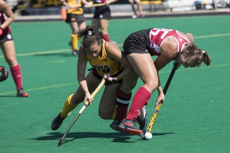 Iowas Mya Christopher fights for the ball during the Indiana field hockey game on Sunday, Sept. 16 2018. The Hawkeyes defeated the Hoosiers (3-0), and have now won six consecutive games.