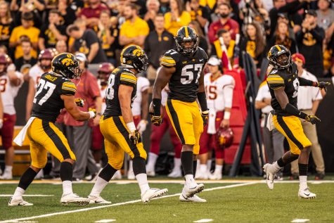 Iowa defensive players celebrate a stop during Iowas game against Iowa State at Kinnick Stadium on Saturday, September 8, 2018. The Hawkeyes defeated the Cyclones 13-3.