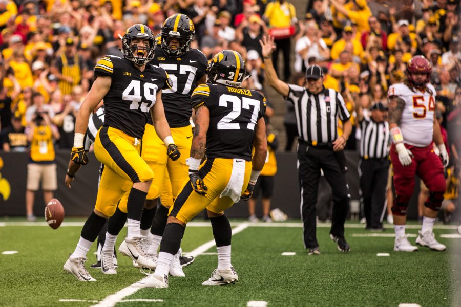 Iowa+Linebacker+Nick+Niemann+%2849%29+celebrates+a+defensive+stop+with+defensive+back+Amani+Hooker+%2827%29during+Iowas+game+against+Iowa+State+at+Kinnick+Stadium+on+Saturday%2C+Sept.+8%2C+2018.+The+Hawkeyes+defeated+the+Cyclones+13-3.