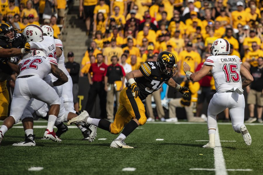 Iowa linebacker Kristian Welch rushes Northern Illinois quarterback Marcus Childers during Iowas game against Northern Illinois at Kinnick Stadium on Saturday, Sept. 1, 2018. The Hawkeyes lead the Huskies 3-0 at the half.