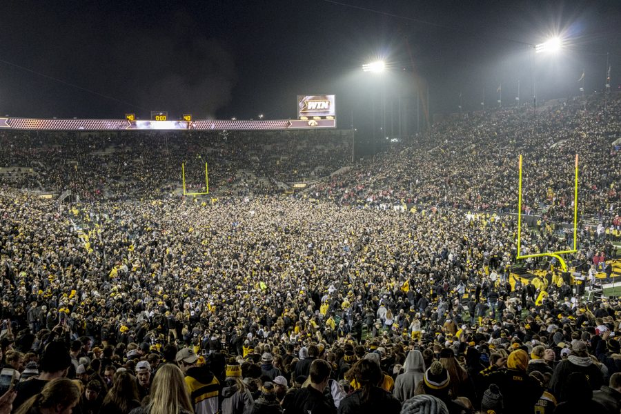 Fans storm the field on Nov. 4, 2017 after Iowa defeated Ohio State, 55-24.
