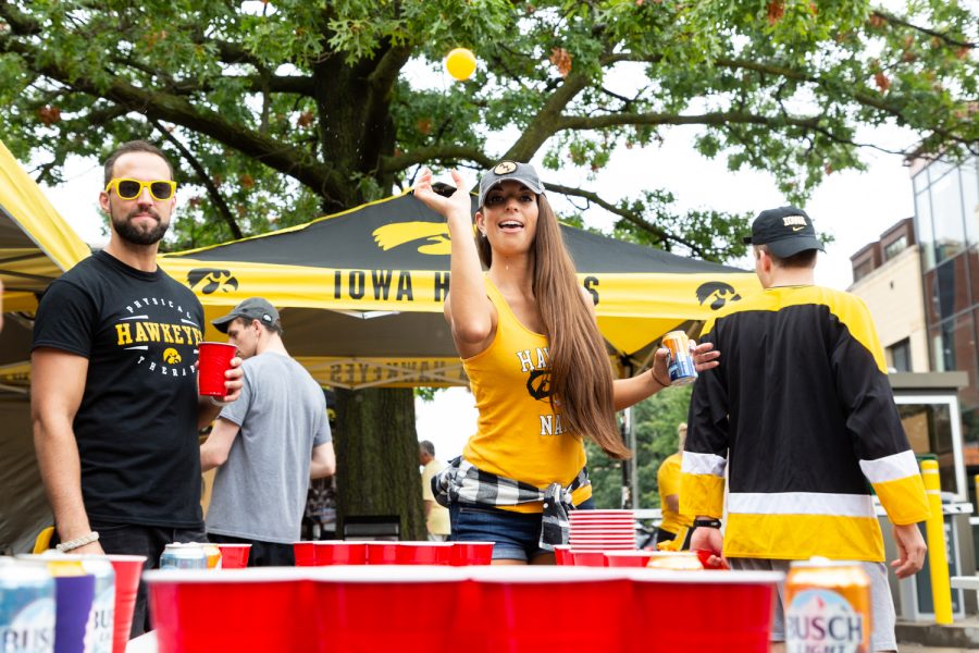 Tambel Thoma from Chicago tailgates before a football game in Iowa City on Saturday, Sept. 1, 2018.  