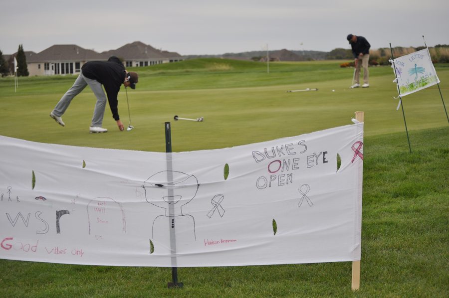 A banner made in honor of the kids at the Stead Family Childrens Hospital waves in the wind at Dukies One Eye Open, a charitable golf tournament in Waverly, Iowa, on Sept. 28.