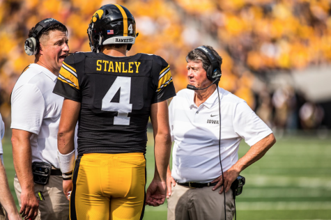 Iowa quarterback Nate Stanley talks with offensive coordinator Brian Ferentz during Iowas game against Northern Illinois at Kinnick Stadium on Sept. 1, 2018. The Hawkeyes defeated the Huskies 33-7.