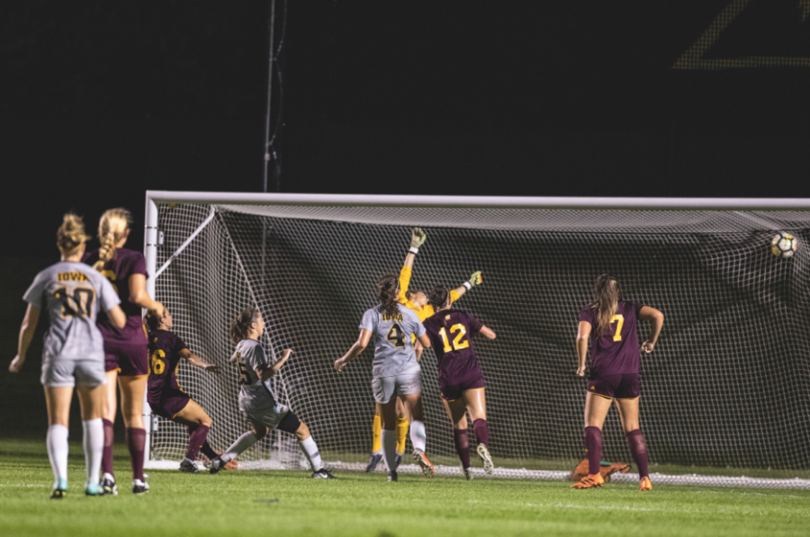 Players look on as Iowa midfielder Josie Durr’s shot finds the back of the net during Iowa’s game against Central Michigan on Aug. 31 at the Iowa Soccer Complex. The Hawkeyes defeated the Chippewas, 3-1.