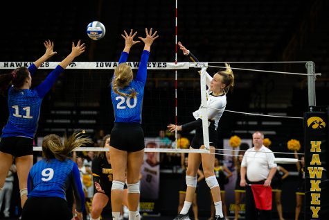 Cali Hoye spikes the ball during Iowas match against Eastern Illinois on Sunday, Sept. 9, 2018 at Carver-Hawkeye Arena. The Hawkeyes won the match 3-0.