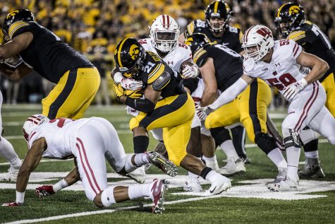 Iowa running back Ivory Kelly-Martin carries the ball during Iowas game against Wisconsin at Kinnick Stadium on Saturday, Sept. 22, 2018. The Badgers defeated the Hawkeyes 28-17.