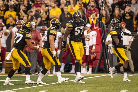 Iowa defensive players celebrate a stop during Iowas game against Iowa State at Kinnick Stadium on Saturday, Sept. 8, 2018. The Hawkeyes defeated the Cyclones 13-3.