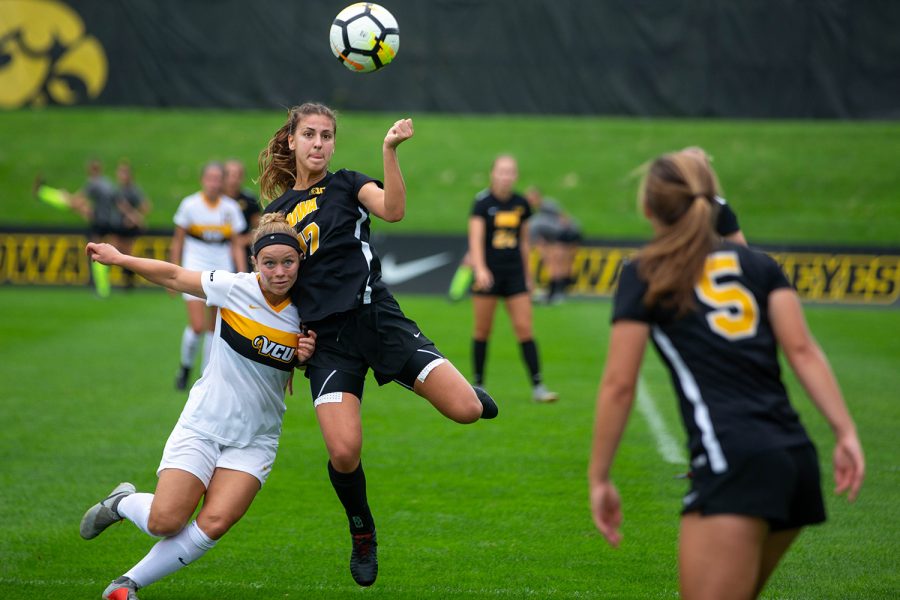 Defender Hannah Drkulec fights for the ball during a game against Virginia Commonwealth University on Sept. 2, 2018. The Hawkeyes won the match 2-0. 