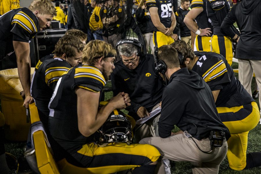Iowa quarterbacks coach Ken OKeefe delivers instructions during Iowas game against Wisconsin at Kinnick Stadium on Saturday, September 22, 2018. The Badgers defeated the Hawkeyes, 28-17.