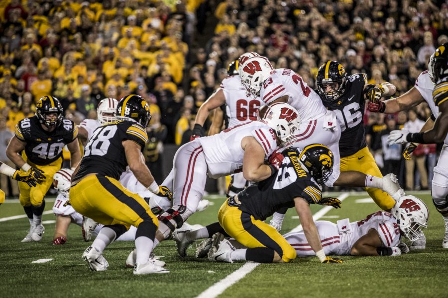 Wisconsin running back Jonathan Taylor carries the ball during Iowas game against Wisconsin at Kinnick Stadium on Saturday, September 22, 2018. The Badgers defeated the Hawkeyes 28-17.