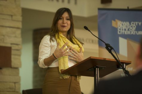 Dina Nayeri, graduate of the Iowa Writers Workshop, addresses the audience as she accepts the 2018 Paul Engle Prize at the Coralville Public Library on Oct. 4, 2018. Nayeri receives this award for her novel Refuge, which details her experience as a refugee and the experiences of many others. 