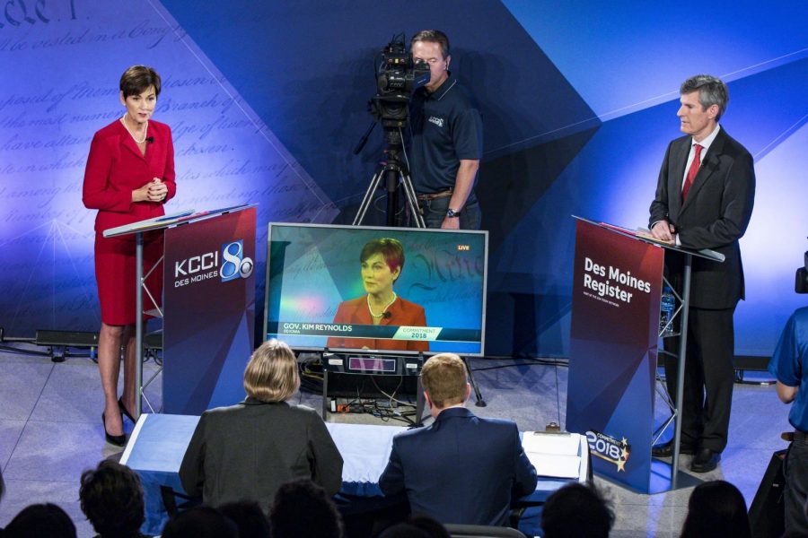 Republican Gov. Kim Reynolds and Democratic contender Fred Hubbell debate at Des Moines Area Community College on Oct. 10, 2018.