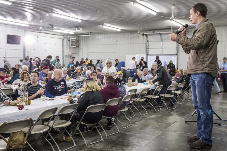 Democratic candidate for Iowa Auditor of State Rob Sand speaks during the Johnson County Democratic Party Fall Barbecue at the Johnson County Fairgrounds on Sunday Oct. 14, 2018. 