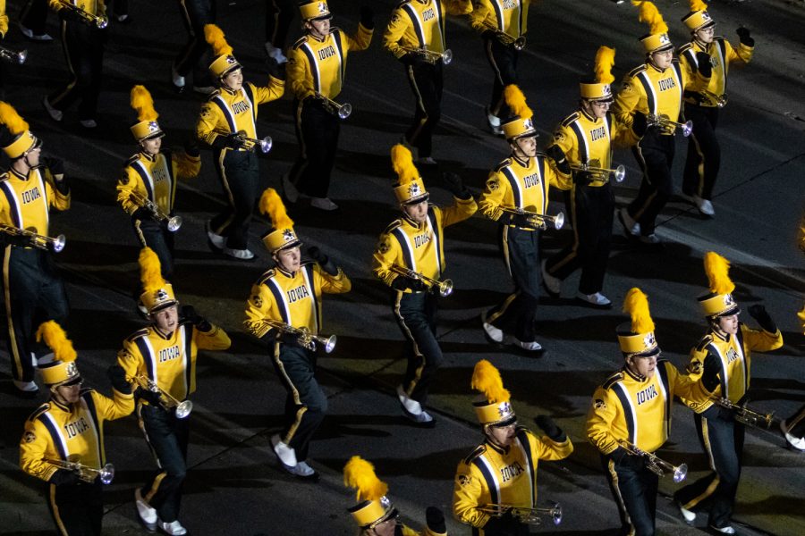 The University of Iowa Marching Band marches in the Homecoming Parade on Friday, Oct. 19, 2018.