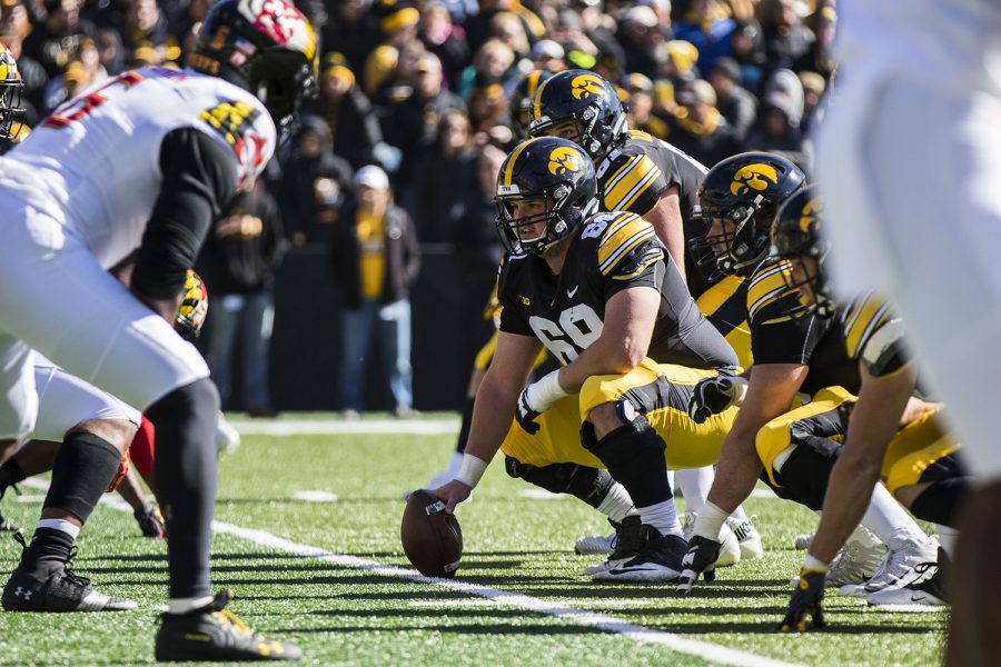 Iowa offensive lineman Keegan Render waits at the line of scrimmage during the Iowa/Maryland homecoming football game at Kinnick Stadium on Saturday, Oct. 20, 2018. The Hawkeyes defeated the Terrapins, 23-0. 