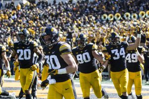 Iowa football players exit the field after scoring a touchdown on a fumble recovery during the Iowa/Maryland homecoming football game at Kinnick Stadium on Saturday, Oct. 20, 2018. The Hawkeyes defeated the Terrapins, 23-0. 