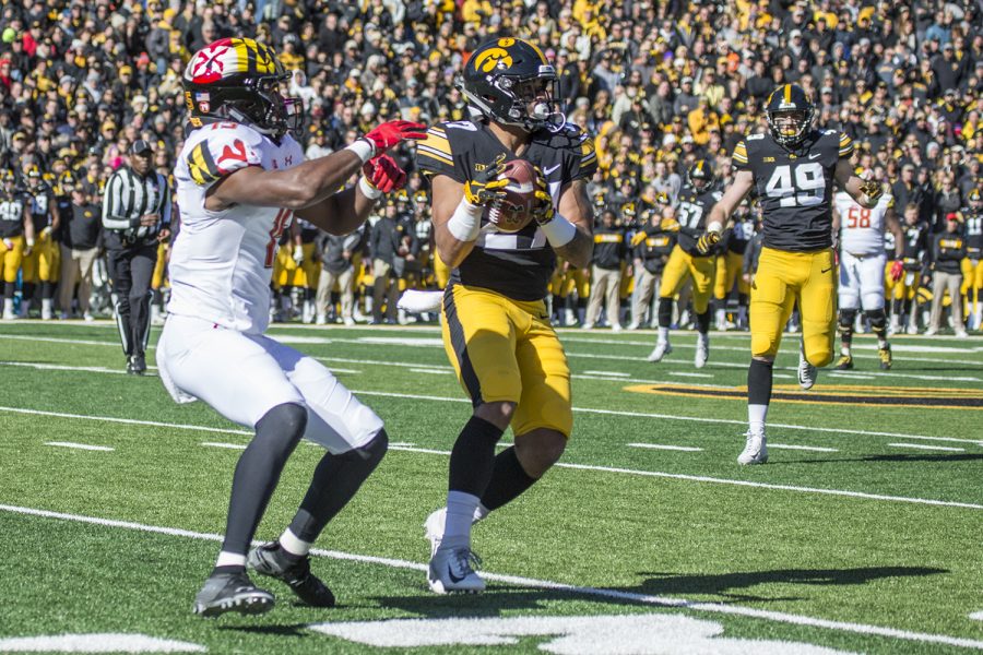 Iowa defensive back Amani Hooker intercepts a Maryland pass during a football game between Iowa and Maryland in Kinnick Stadium on Saturday, October 20, 2018. The Hawkeyes defeated the Terrapins, 23-0. 