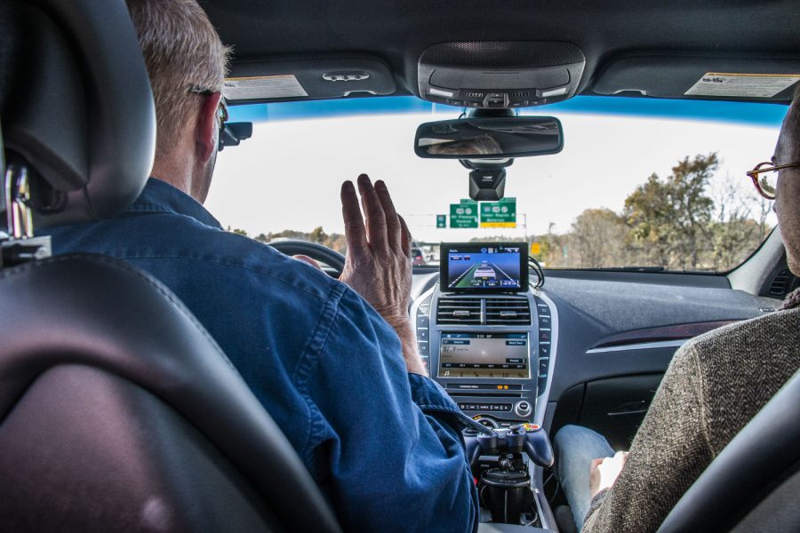 Engineer Greg Wagner drives the autnomous new Lincoln MKZ on I-80 on Wednesday, October 24, 2018. The researchers are creating new softwares to enhance autonomous features in Tesla and Lincoln MKZ.