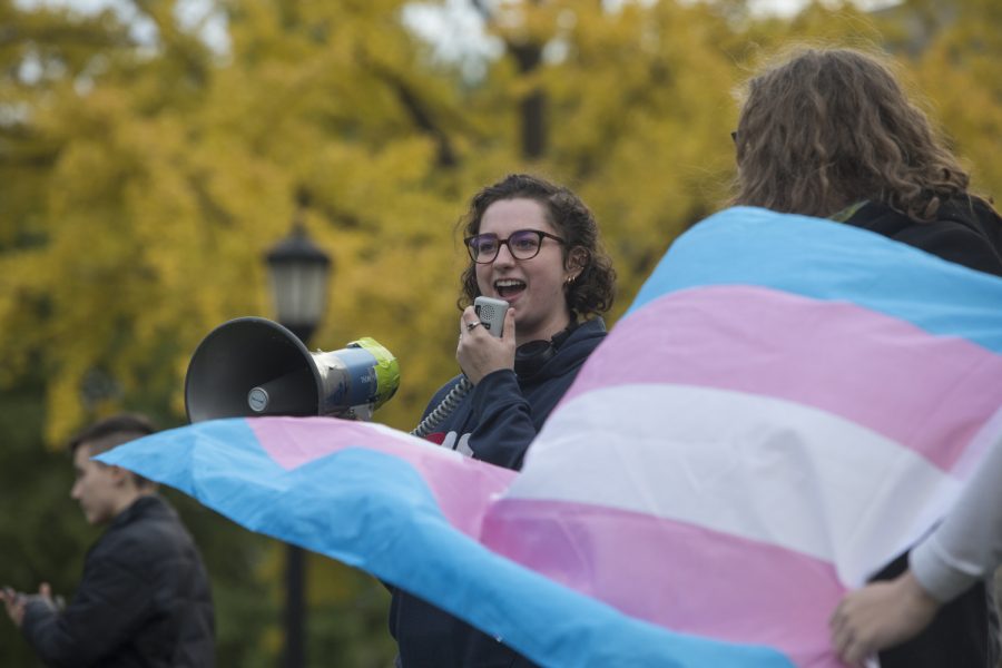 Margo O'Neill addresses the crowd during a transgender rights rally on the Pentacrest on Thursday, Oct. 25, 2018. Protesters gathered to promote rights in light of the upcoming elections.