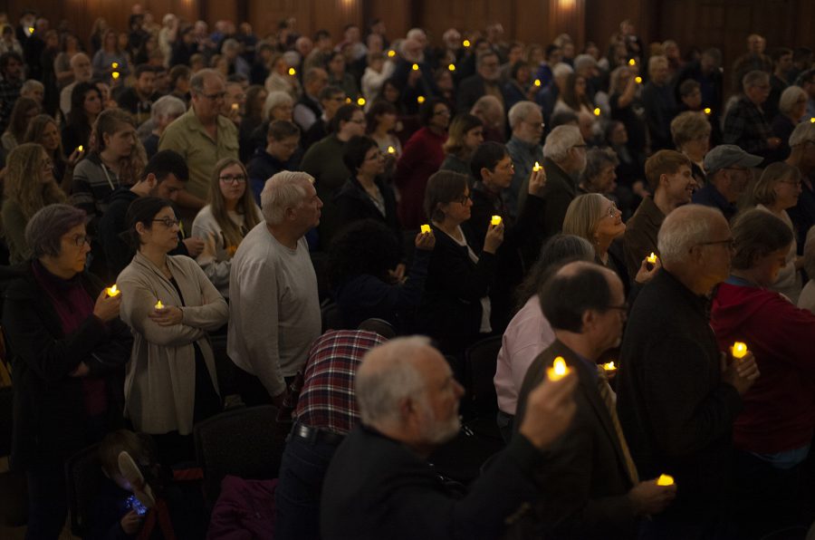 More than 100 people held candles and sang traditional Jewish songs during a vigil for the shootings in Pittsburgh and Louisville in the Iowa Memorial Union on Tuesday, Oct. 30, 2018. Members of the Jewish and African American communities came to mourn the loss of those who were killed in last weeks shootings at Kroger and Tree of Life Synagogue.