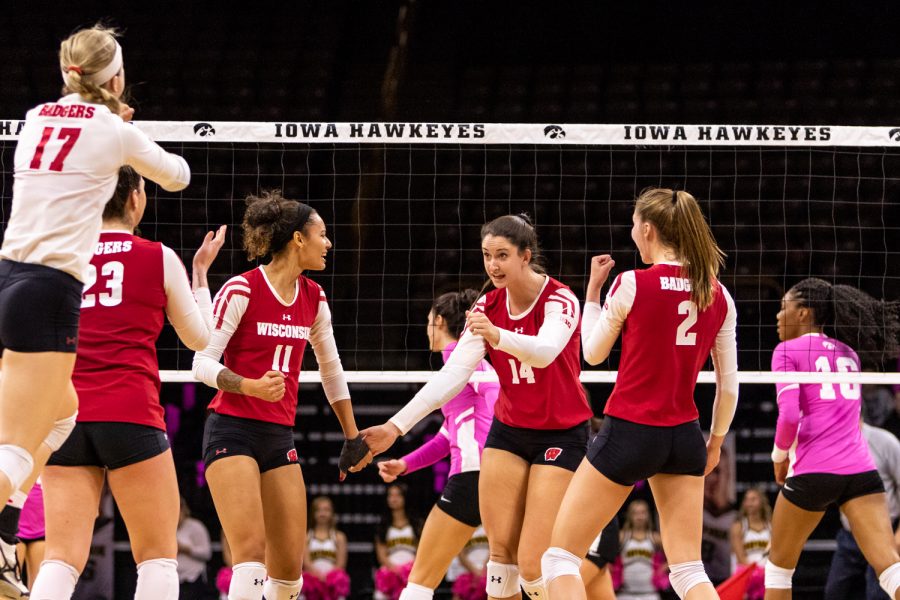 Wisconsin celebrates scoring a point during a volleyball match against Wisconsin on Saturday, Oct. 6, 2018. The Hawkeyes defeated the number six ranked Badgers 3-2. 