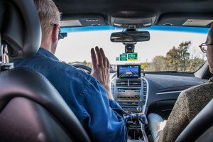 Engineer Greg Wagner drives the autonomous new Lincoln MKZ on I-80 on Wednesday, Oct. 24, 2018. The researchers are creating new softwares to enhance autonomous features in Tesla and Lincoln MKZ. 