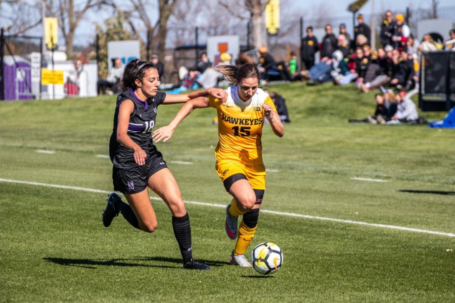 Iowa forward Rose Ripslinger dribbles the ball up the field during Iowas game against Northwestern on Oct. 21, 2018. Iowa tied Northwestern 1-1. 