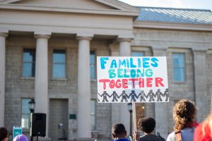 Community members partake in an immigration reform rally at the Pentacrest on Oct. 27, 2018. Iowans who have been negatively impacted by immigration shared their stories during the rally.
