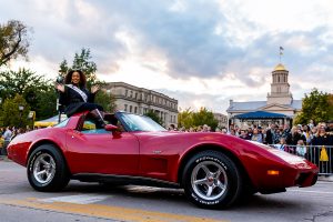 Miss Iowa rides in Corvette in front of Old Cap during the Homecoming Parade on Friday, Oct. 19, 2018. (David Harmantas/The Daily Iowan)