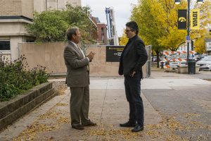 From left: UI President Bruce Harreld and Psychological and Brain Sciences Chair Mark Blumberg speak outside the construction on the new Psychology and Brain Sciences Building on Monday, Oct. 8, 2018. The facility is expected to open in January 2020. 