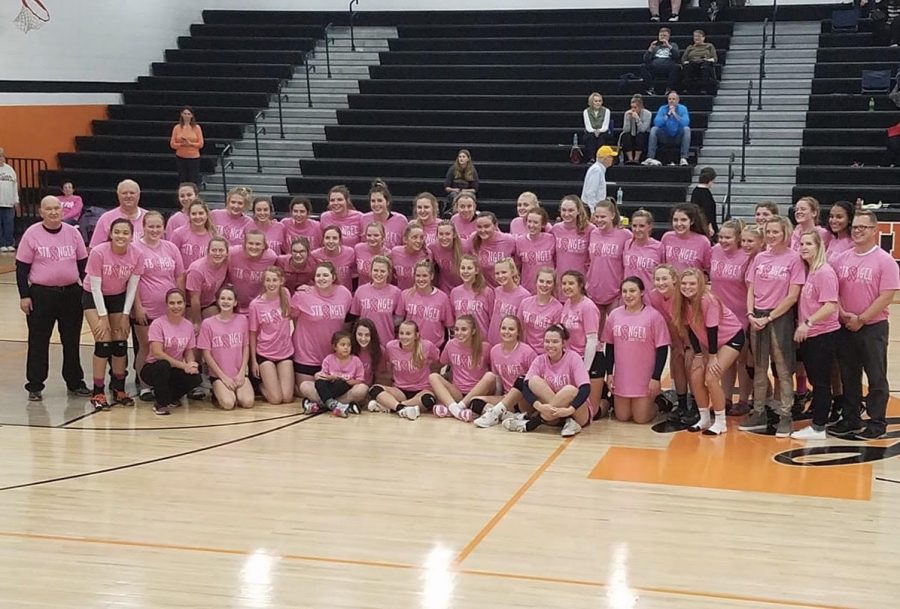 Rival Iowa volleyball teams raise $700 for Holden Cancer Center