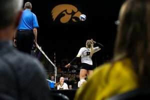 Reghan Coyle spikes the ball during the Iowa Volleyball game against Northwestern at Carver-Hawkeye Arena in Iowa City on Wednesday, Oct. 25, 2018. Northwestern defeated Iowa 3-2. 