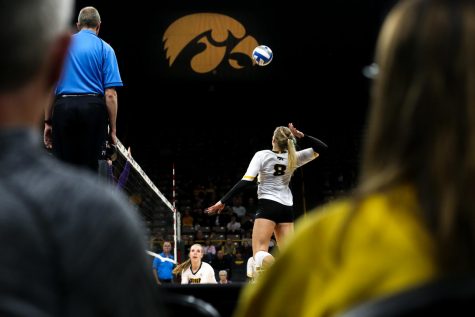 Reghan Coyle spikes the ball during the Iowa Volleyball game against Northwestern at Carver-Hawkeye Arena in Iowa City on Wednesday, Oct. 25, 2018. Northwestern defeated Iowa 3-2. 