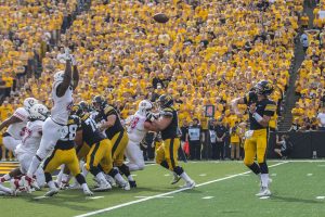 Iowa quarterback Nate Stanley throws a touchdown pass during the Iowa/NIU football game at Kinnick Stadium on Saturday, Sept. 1, 2018. The Hawkeyes defeated the Huskies, 33-7. 